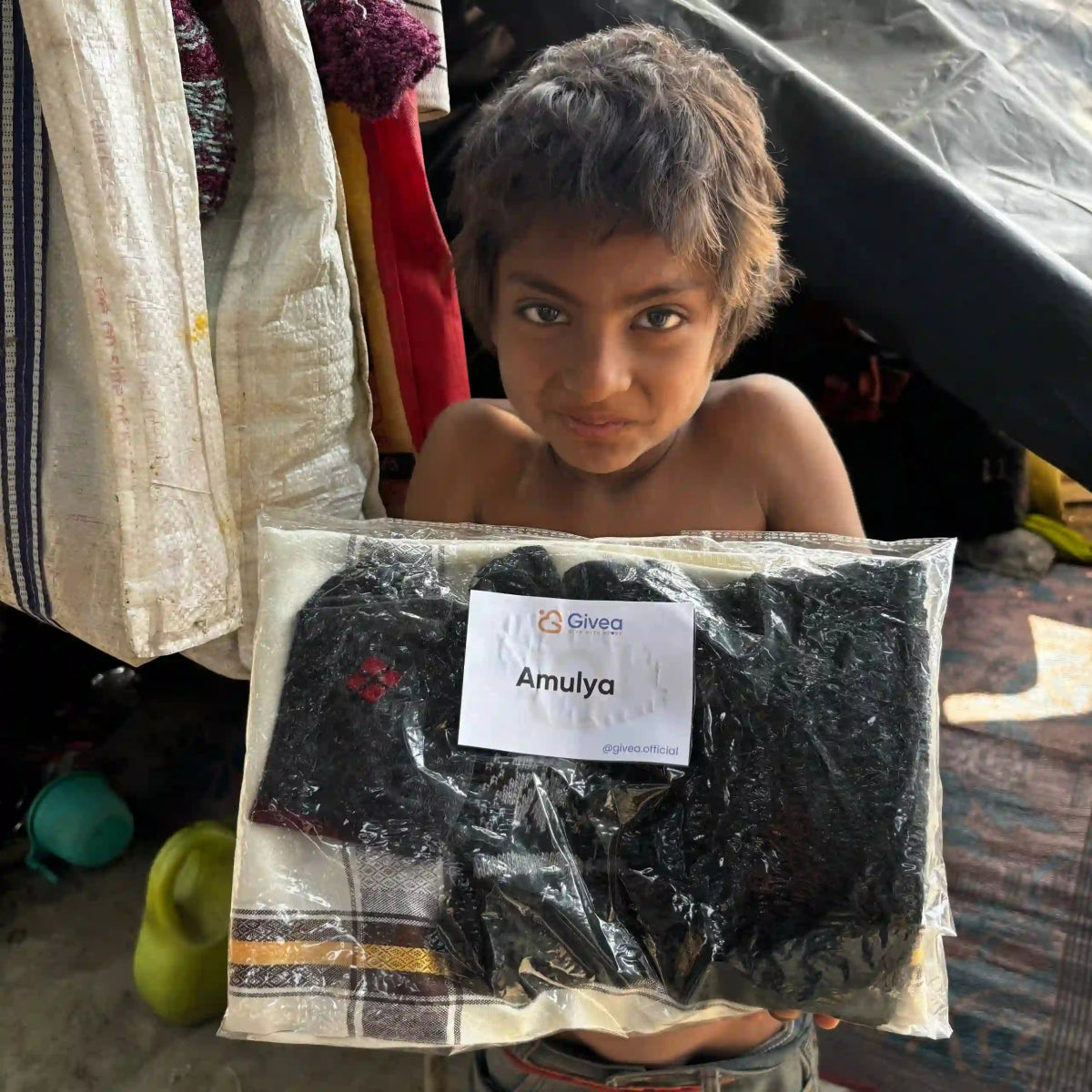 Provide a Winter Sweater for a Child - Givea